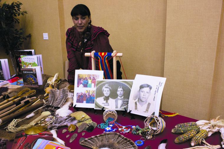 Pablo Arauz.
Amy Bruton-Bluemel teaches students about Southeastern cultures at the Native American Heritage Month celebration on Nov. 5 in the faculty dining room. Wearing her red regalia and surrounded by artifacts, Bruton-Bluemel demonstrated the customs of Chickasaw life.