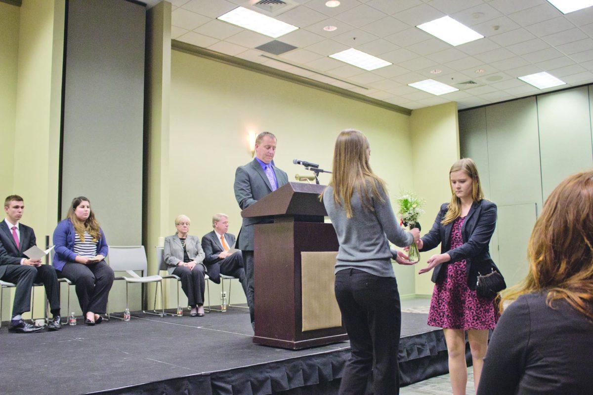 Marcelo Yates
As Dean of Students Gene Fitch individually recognized each student, flowers were given to the family members of the students who have passed away in the last year. SG senators accepted flowers on behalf of families who could not attend.