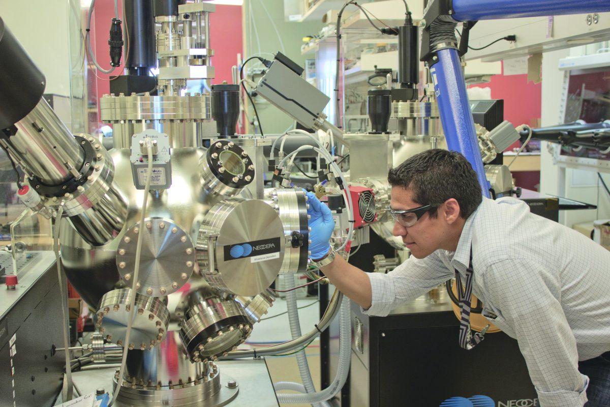 Parth Parikh
Research associate Israel Mejia examines equipment in the material sciences research lab in north campus. This NSERL lab represents some of the most advanced technological work being done at the university, including diamond-coated chips that may partially restore sight in those with vision loss.