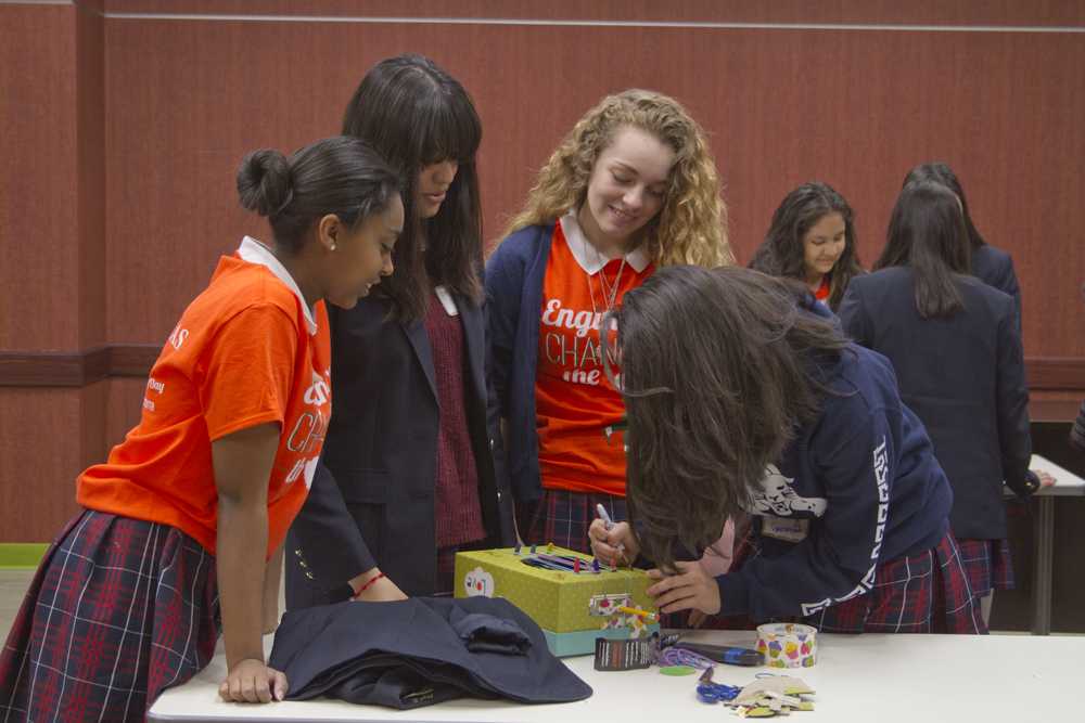 Jennifer Chi| Staff
From Left: Irma Rangel ninth-grade students Abgel Testaye, Kathy Villa, Magan Stewart and Genesis Gutierrez work on the musical instrument they designed during Introduce a Girl to Engineering Day. 