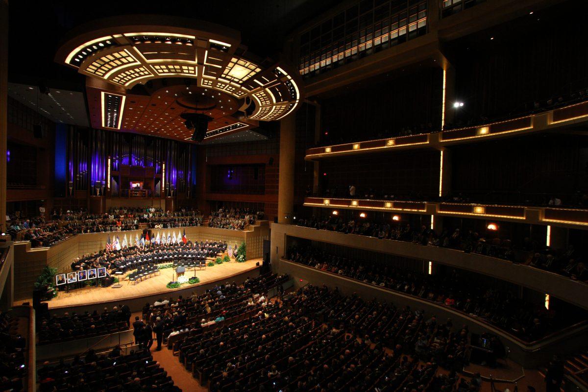An estimated 2,500 people attended the interfaith tribute for the deceased officers, including press, choir, officers, guests and volunteers.