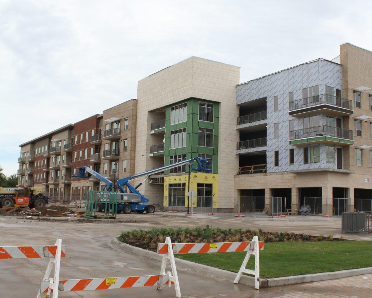 Northside, which is managed by Balfo ur Beatty Communities, rented buses to take residents to and from the hotels where they’re staying. Photo by Esteban Bustillos.