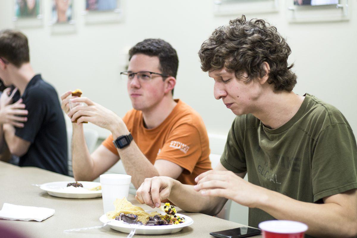 Members of UTD’s Gourmet Club gather several times per semester to catch up and share a meal. The club also teaches students how to cook healthy and affordable food. Photo by Chris Lin | Mercury Staff.