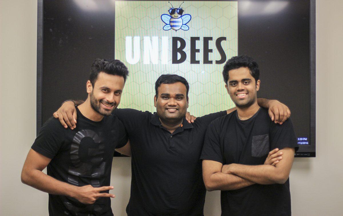 International students (left to right) Sanjay Kurani, Chandra Achanta and Abinav Kalidindi founded a phone application called UNIBEES that helps students find affordable events to attend on campus. Photo by Ankith Averineni | Mercury Staff.