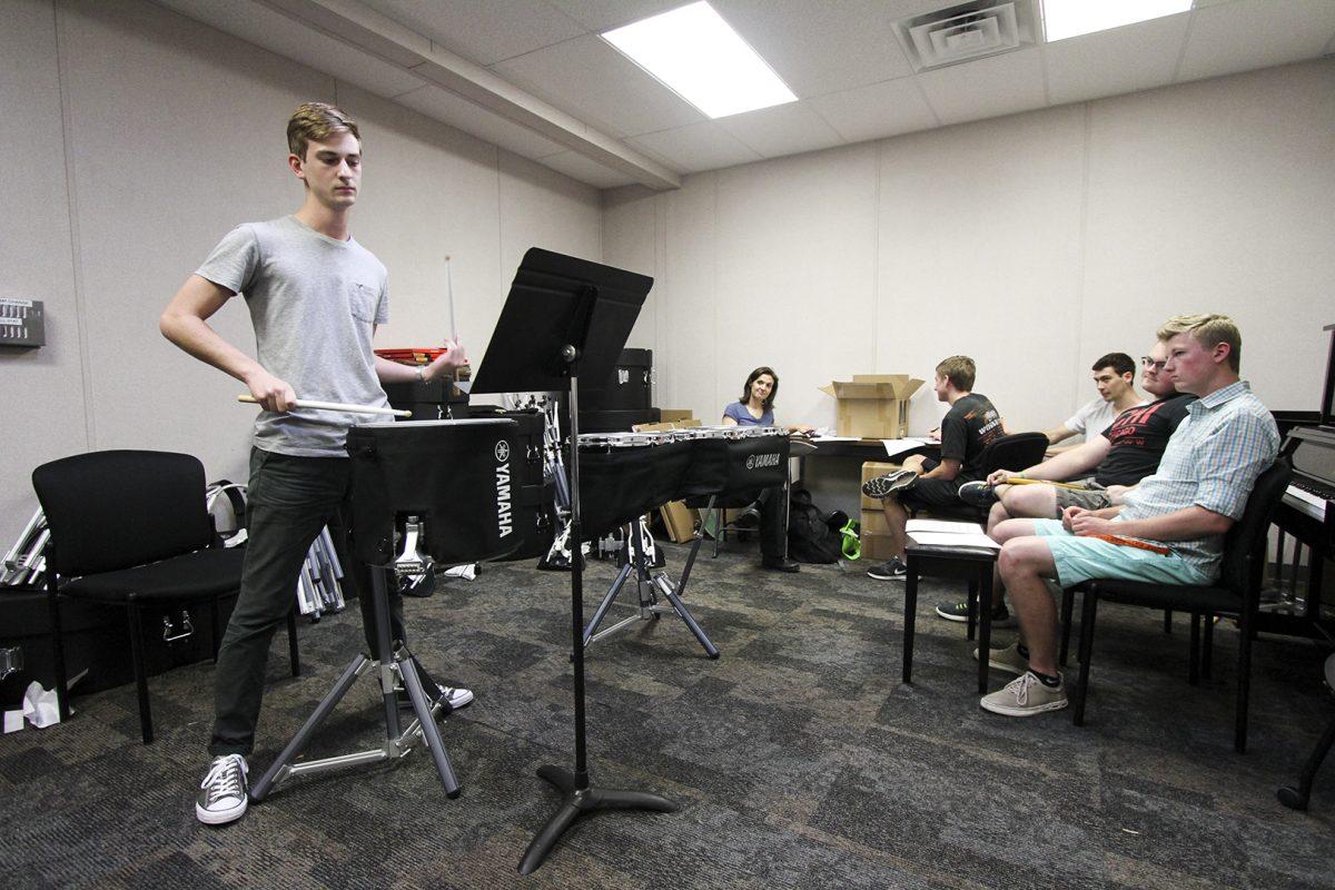 Biomedical engineering freshman Steven Robinson performs during tryouts for the UTD drumline in front of Director Lori Gerard and the original four members of the drumline on Aug. 22. The drumline is looking to play at a volleyball game in October for its first public appearance. Photo by Yash Musalgaonkar | Mercury Staff.