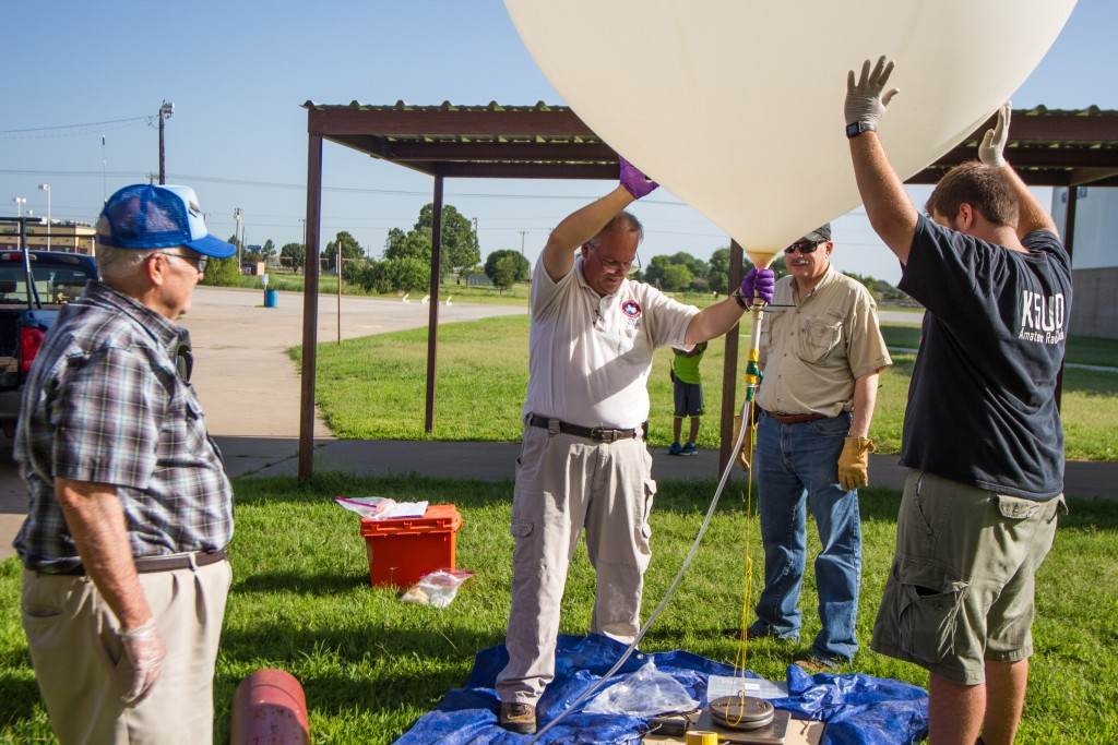 Andrew Koenig, a telecommunications engineering senior and the president of K5 UTD, helps prepare to launch a weather balloon in a competition. Balloons like these allow the club to help the weather service in Texas with their tracking. Photo courtesy of Andrew Koenig.