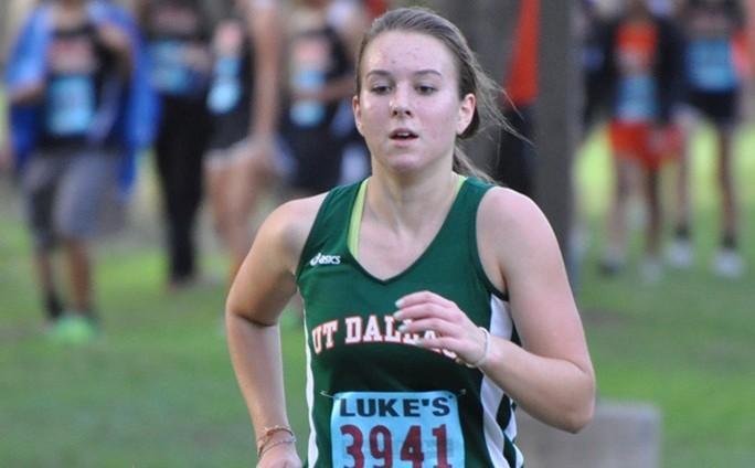 Samantha Hartke, a geoscience senior, runs in a cross-country meet for UTD. Hartke is teammates with her sister, Sara Hartke. They both moved to Dallas from Alaska, where they spent most of their childhood. Photo courtesy of UTD Cross-Country.