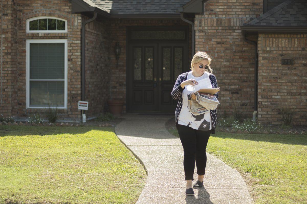 Alumna Tessa McGlynn went block walking in neighborhoods on Oct. 1 to encourage people to vote for Jim Burke. Photo by Chris Lin | Mercury Staff.