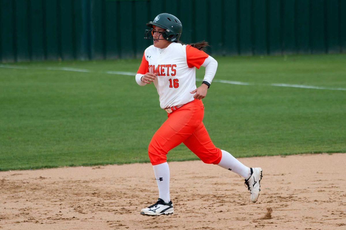 Alumna Sara Navarro, who played softball for four years while attending UTD, rounds the bases during a game.  Navarro is the first student athlete from UTD to be chosen to attend the prestigious Immersion Program at the NCAA Convention in Nashville. Photo courtesy of Sara Navarro.