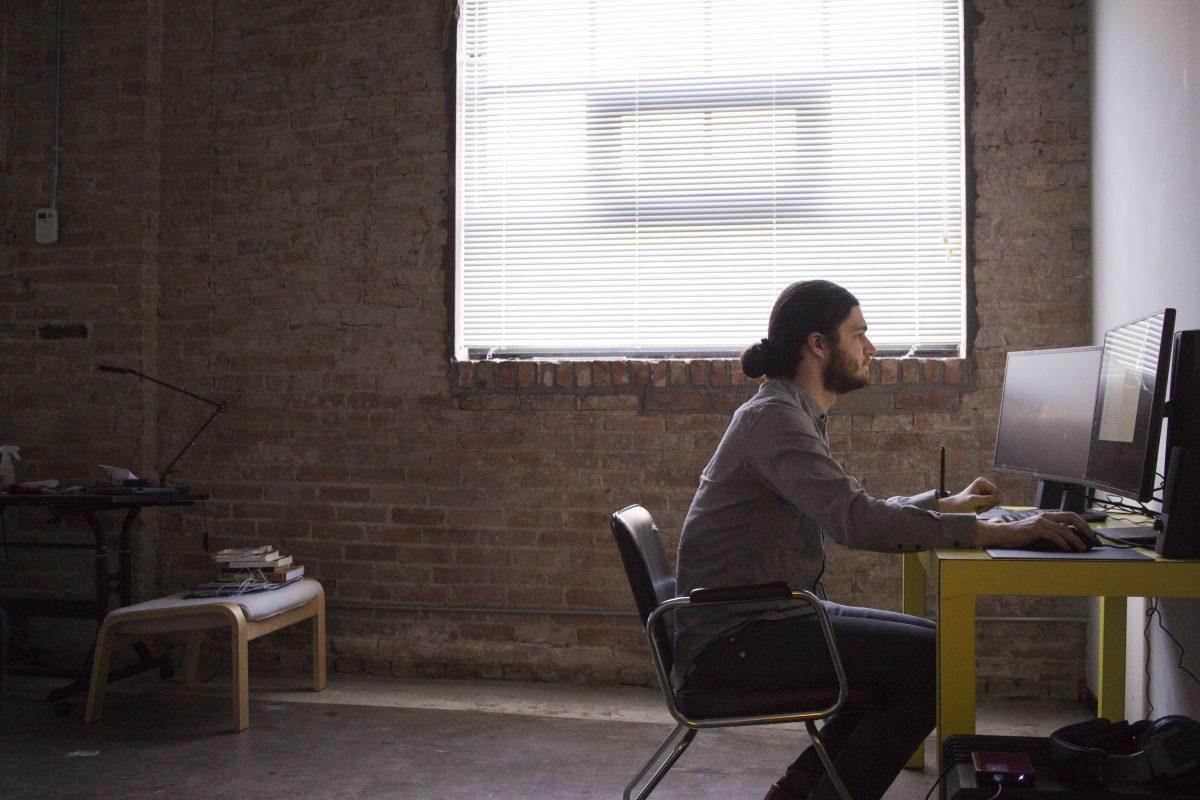Clayton Harper, an artist in residence at CentralTrak, will have to move out of the living space after the lease ends in June. Harper said he is waiting for new information as faculty looks for alternative space for a similar or new program. Photo by Chris Lin | Mercury Staff.