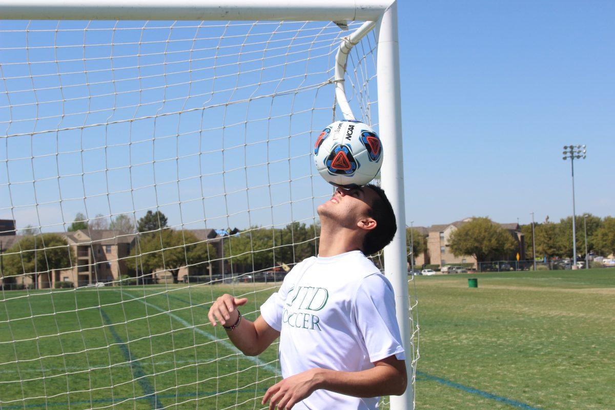 Alfredo Kaegi, a left wing and forward, practices on the UTD soccer field on March 21 as he works on rehab following knee surgery. Kaegi came to UTD to earn his degree after playing soccer for semi-pro teams in France for eight months. He played his first season at UTD this past fall, which brought him recognition on the playing field  as he won multiple awards. He intends to go pro after getting his degree, which will provide him with a back-up plan for his athletic career. Photo by Ruth Varghese | Mercury Staff.