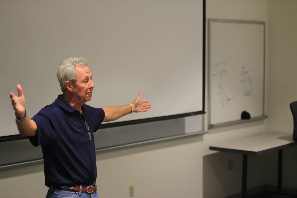 Geoffrey Westapher, one of the course’s guest lecturers, speaks about his experience in the beer industry and his work as an industry consultant. Photo by Deepak Godavarthi | Mercury Staff.