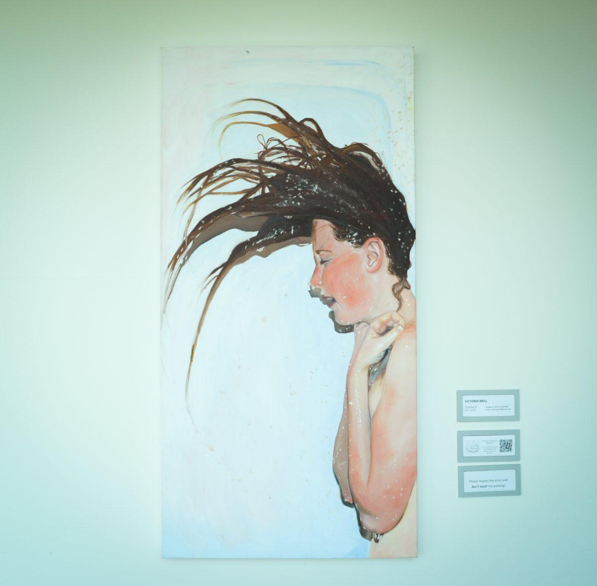 Visual and performing arts senior Victoria Brill featured her painting, “Untitled II,” at a recent LOTUS project exhibition. Photo by Madeline Ambrose | Mercury Staff.