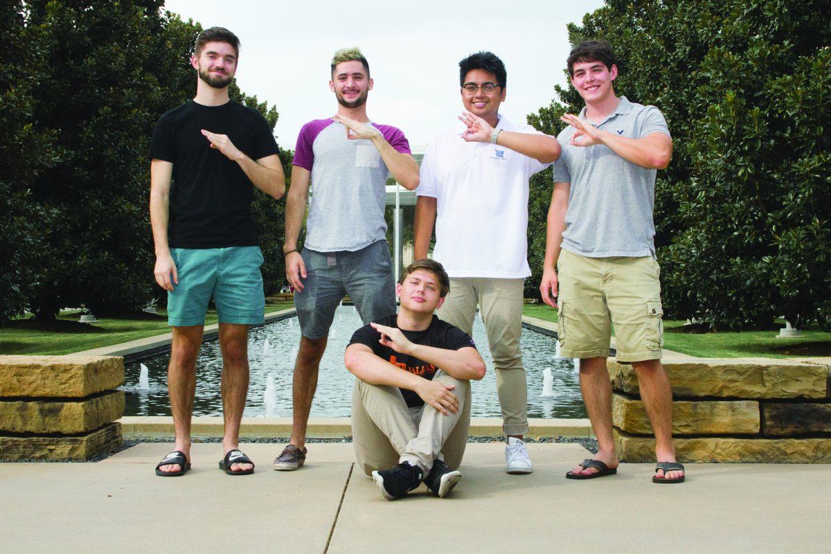 Nicholas Lormand (left), Dylan Capece, Raphael Colombelli and Hunter Tranchina whoosh as members of a new fraternity. The members found the frat this past August. Photo by Michael Stout | Mercury Staff.