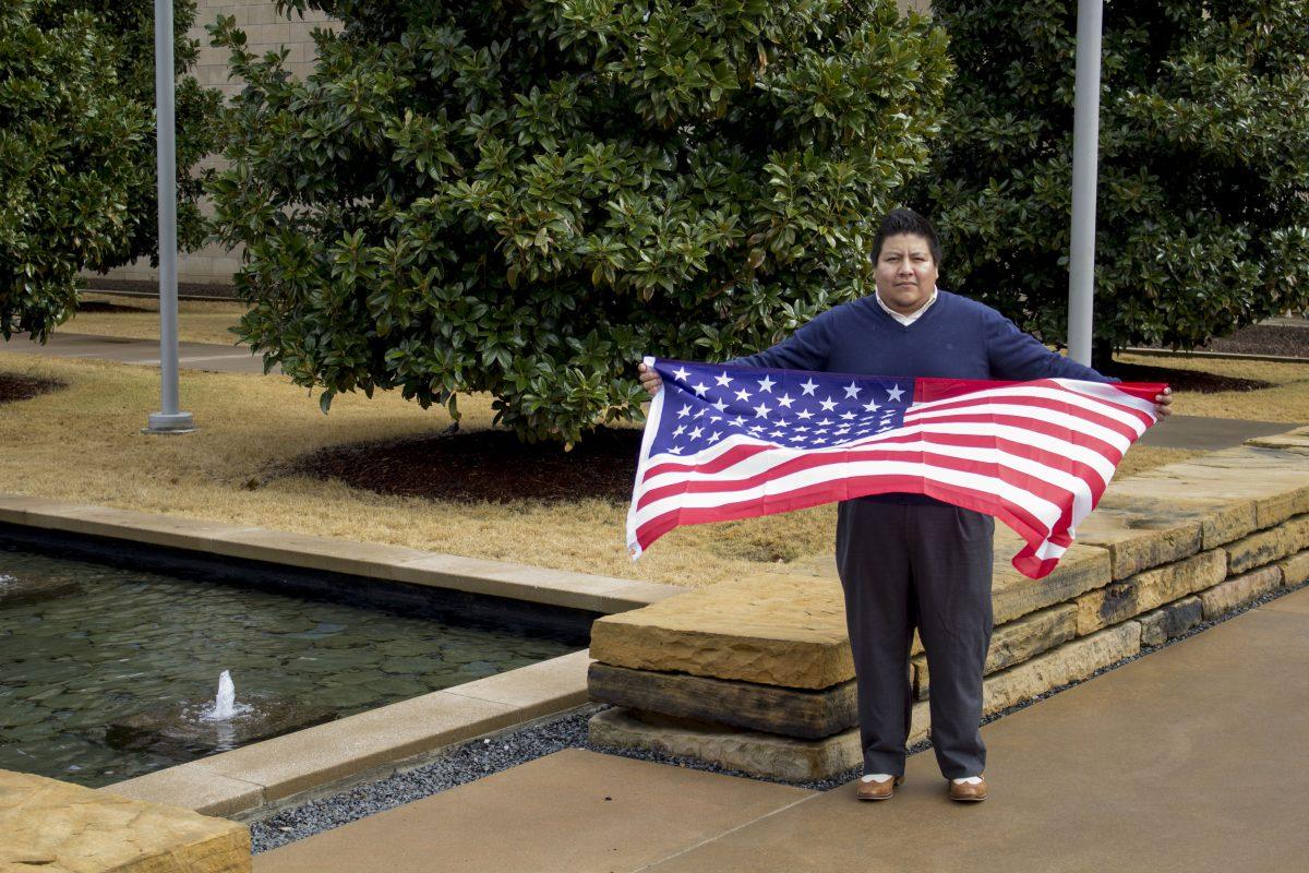 Henry Justiniano, a mechanical engineering sophomore, came to the United States in 1989 as a refugee from El Salvador. Since then, he has served in the military and become a naturalized citizen. Photo by Ambarina Hasta | Mercury Staff.