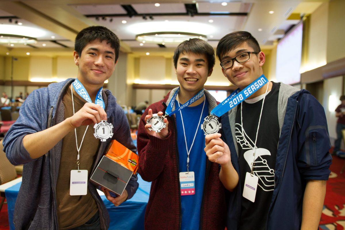 Computer science freshmen (from left to right) Michael Xu, Camden Squire and Kevin Dao won the grand prize at TAMUHacks 2018, the Texas A&M annual hackathon. Photo courtesy of TAMUHacks.