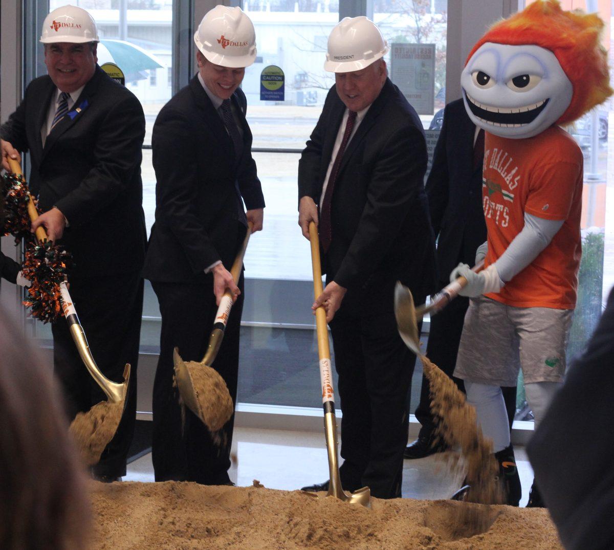 On Feb. 20, city of Richardson Mayor Paul Voelker (left), Student Government President JW Van Der Schans, President Richard Benson and Temoc helped to breakground on the new Science Building. Photo by Michael Stout | Mercury Staff.
