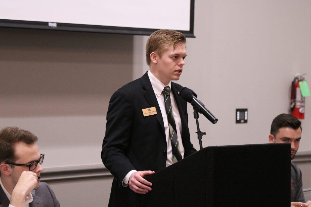 Student Government President JW Van Der Schans speaks at a general senate meeting on March 6. Van Der Schans and SG Vice President Alex Holcomb (left) reflect on their time in office as the election for next year’s representatives approaches. Photo courtesy of Student Government.