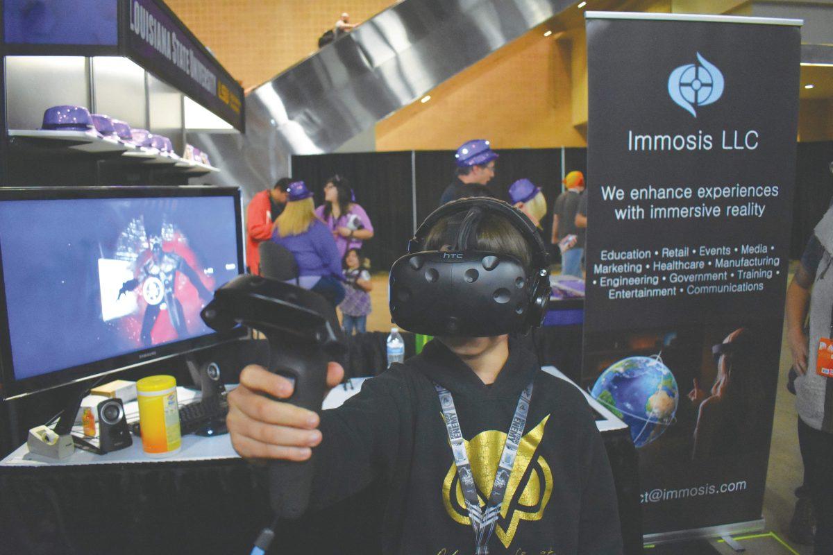 Business partners Brian Hoang and Marwan Kodeih demonstrated their upcoming virtual reality horror game “Amelia's Curse” to attendees at the SXSW Festival held in Austin in March of this year. Photo courtesy of Immosis.