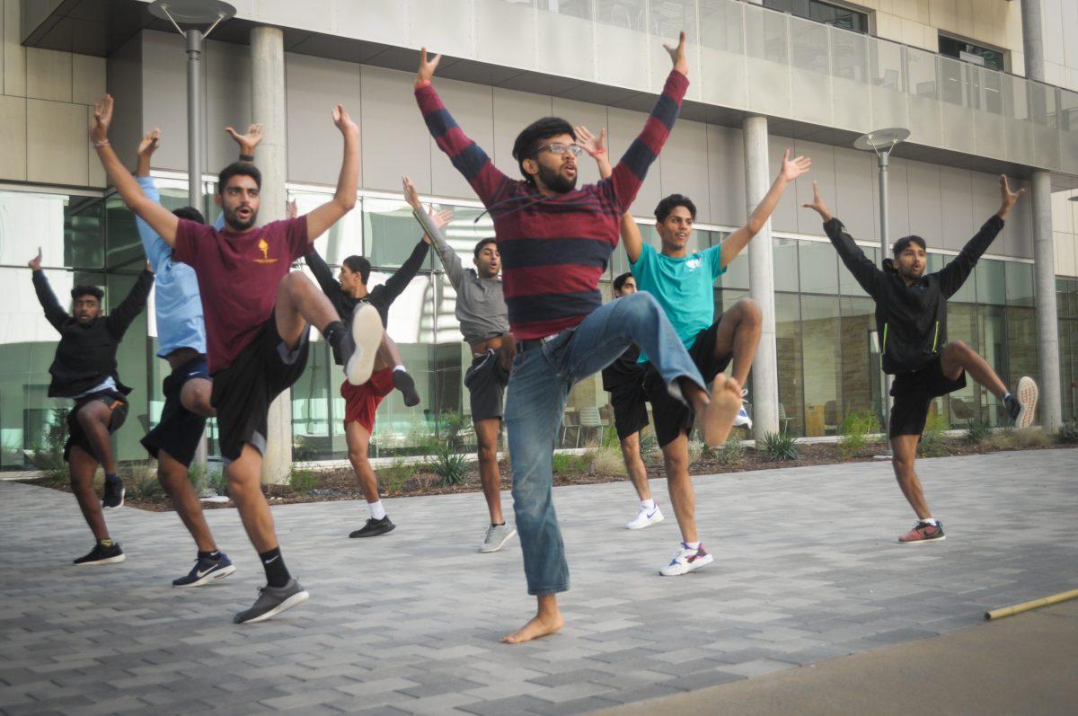 Members of UTD Raftaar practice in the courtyard of ECSW. The group will perform at Jhalak, one of the only Bollywood fusion competitions in the nation that requires teams to perform without props. Photo by Madeline Ambrose | Mercury Staff.