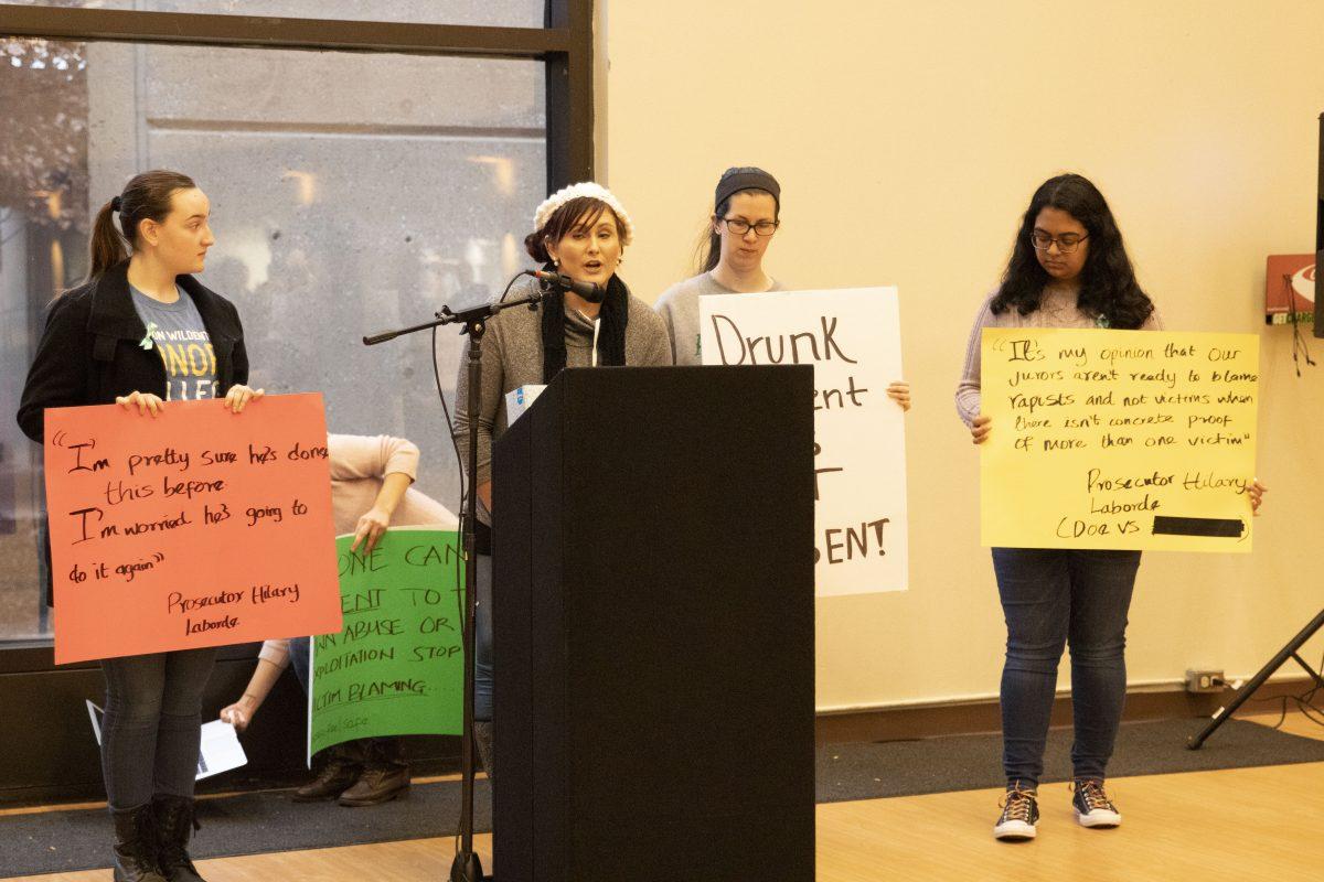 A group of students held a rally to support sexual assault victims on Dec. 14 in the Student Union. Photo by Nikita Bantey | Mercury Staff.