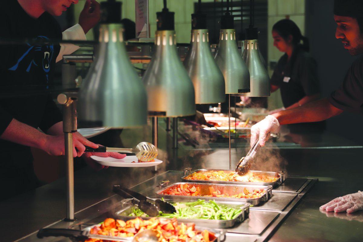 Eight of 10 Chartwells employees who spoke to The Mercury said they did not receive state-mandated food safety training in a timely manner. Photo by Nikita Bantey | Mercury Staff.