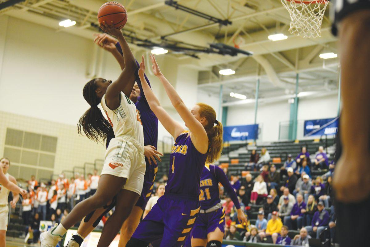 Sophomore guard Raenett Hughes shoots against the University of Mary-Hardin Baylor in the second round of the NCAA championships. Photo by Aasav Sureja | Mercury Staff.