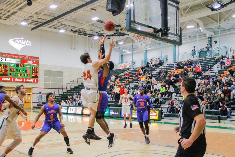 Senior guard Jeremiah Gibson attempts to score at a Jan. 16 match against Louisiana College. The Comets won the game 82-59. Photo by Roshan Khichi | Mercury Staff