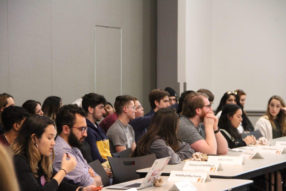 Students listen as SG President Ayoub Mohammed gives updates on COVID-19. Photo by Cindy Folefack | Editor-in-Chief