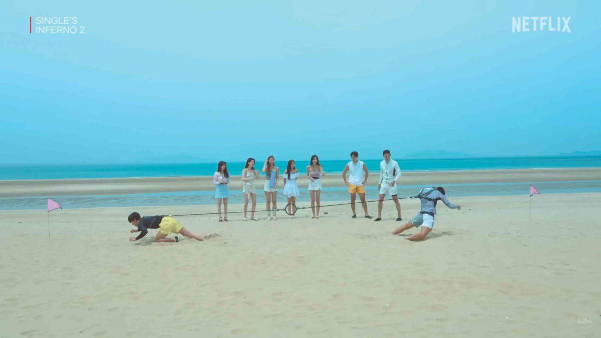 The contestants of ‘Single’s Inferno’ battle it out in games on the beach. Photo courtesy of Netflix.