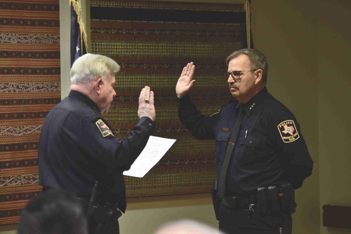 UT System Director of Police Michael Heidingsfield conducts Tourangeau’s coronation. Photo By Devinee Amin | Mercury Staff