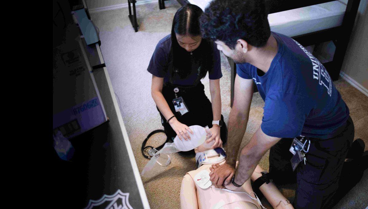 Students acquire hands-on training in medical crises, ranging from appendicitis to heart attacks and pediatrics to geriatrics. Two students practice CPR procedures on a dummy as part of the EMT course. One student provides the dummy with oxygen with a bag valve mask, or BVM, while the other administers chest compressions. An electrode on the dummy's chest connects to the EKG to record heartbeats.

All Photos By Ruben Rodriguez | Mercury Staff