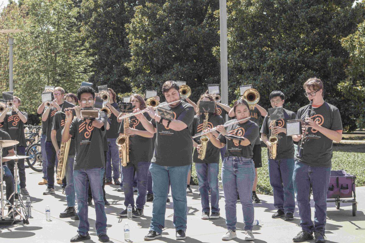 UTD's Pep Band performs the iconic fanfare that can be heard during sports
games. With a history spanning over a decade, the Pep Band continues to represent Comet spirit through music. Photo By Ruben Rodriguez | Mercury Staff